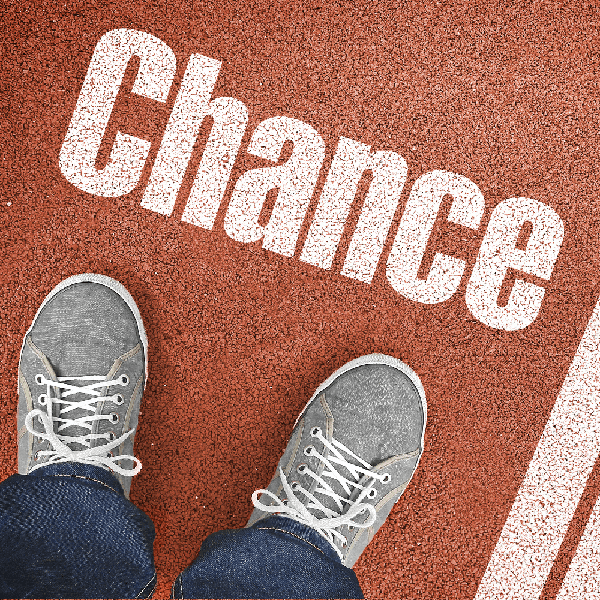 das Wort Chance geschrieben auf granularer Oberfläche